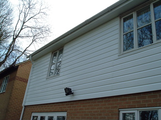 Roofline and white UPVC cladding