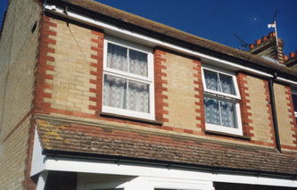 UPVC White fascia soffit and black guttering