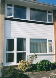 UPVC White cladding and new double glazed windows and door