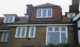 UPVC White fascia soffit black Ogee guttering and dormer