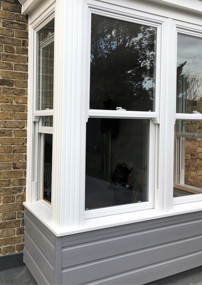 UPVC Double Glazed Sliding Sash Bay Window