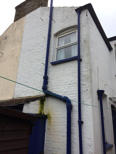 Degraded and mouldy masonry paint