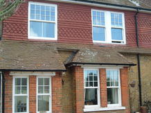 Double glazed UPVC sliding sash window Birchington