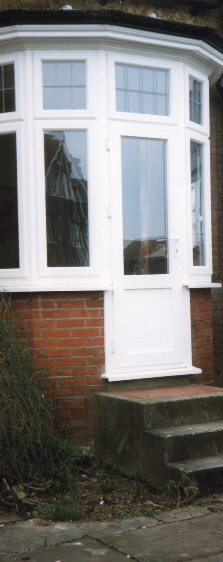 UPVC double glazed bay with door