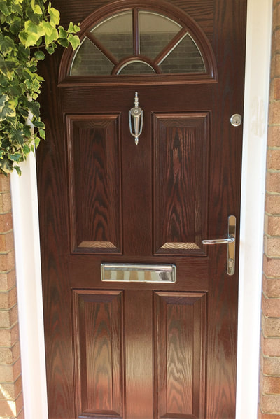 Composite door Entrance 44 rosewood with additional rim lock