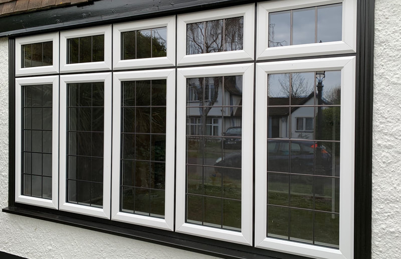 White on Black grain UPVC window