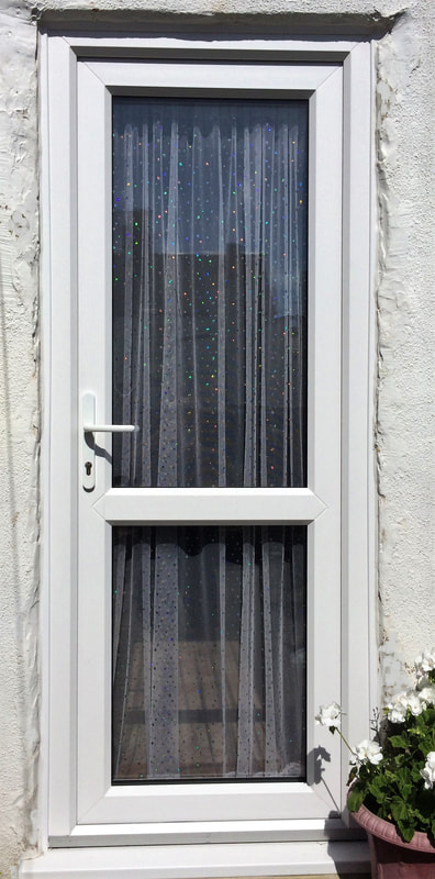 Double glazed two pane rear entrance UPVC door