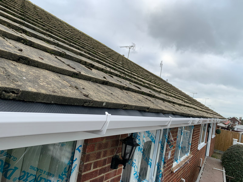 New gutter in place with damp proof membrane installed