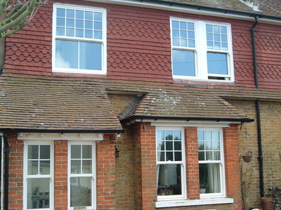 UPVC sliding sash double glazed window astragal Georgian bar grid