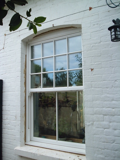 UPVC sliding sash double glazed window astragal Georgian bar grid